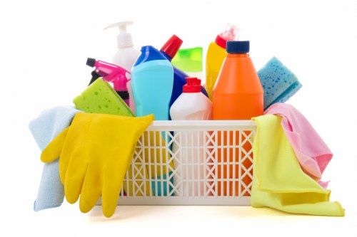 Local carpet cleaner treating stains in a Barnes property